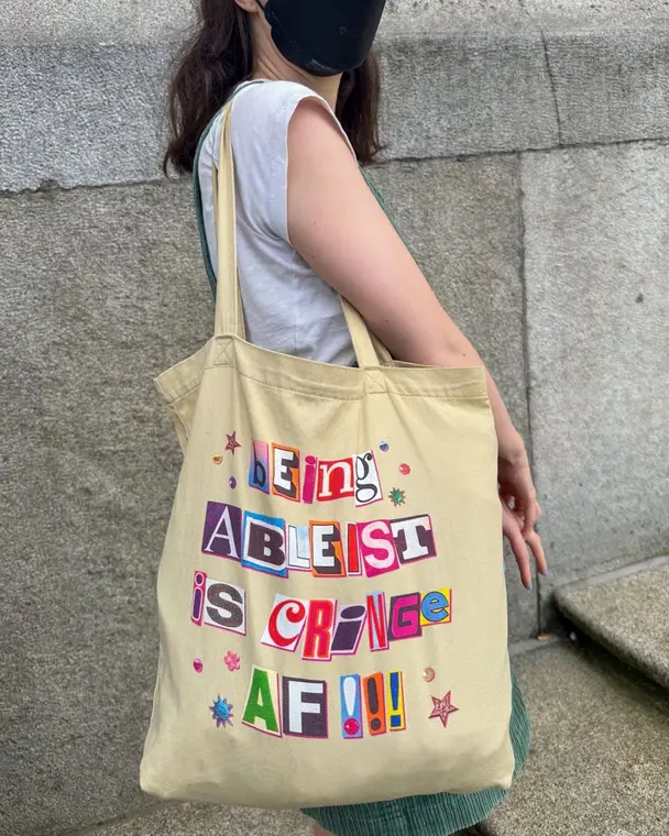 Tote bag in ransom-note lettering: Being ableist is cringe AF!!!